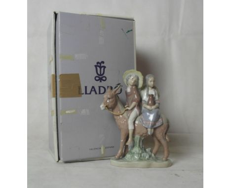 A boxed Lladro figure "A ride in the country" 5354