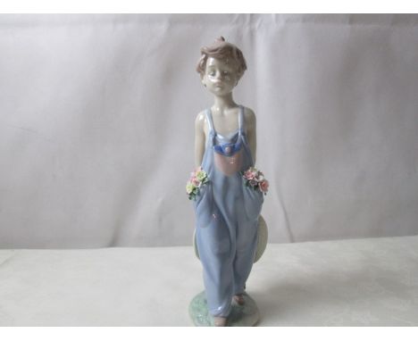 A Lladro boy in dungarees (Collectors Society No 7650)