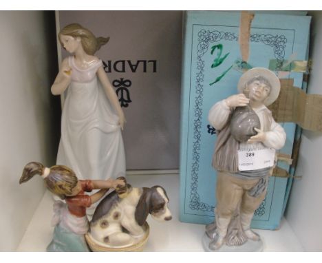 Three boxed Lladro figures "Sancho" 5165, "Bashful Bather" 12273 & "Afternoon Promenade" 07636