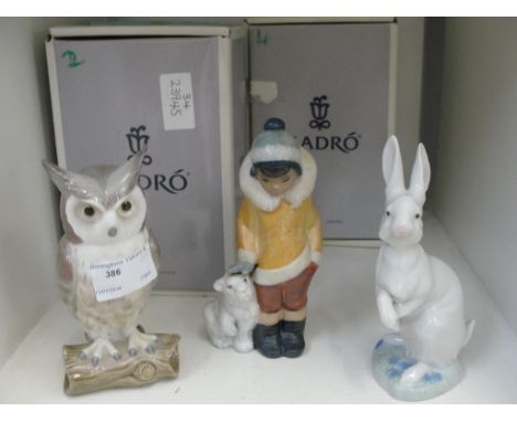 Three boxed Lladro figures: "Owl 5420, "Hippity Hop" 05886 & "Eskimo Boy" 12269