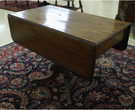 A 19th century mahogany drop-leaf table on tripod base