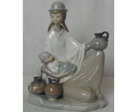 A large figure of a Lladro girl in hat with baby