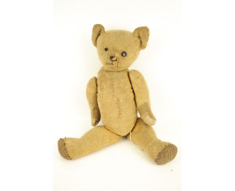 A vintage jointed teddy bear. H43cm