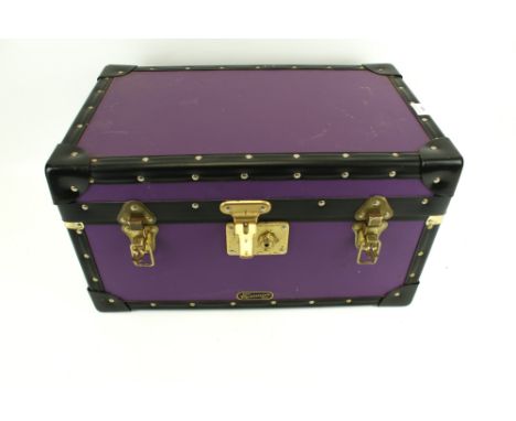 A small contemporary travelling trunk. Purple, with a papered interior and handles to either end, L51cm