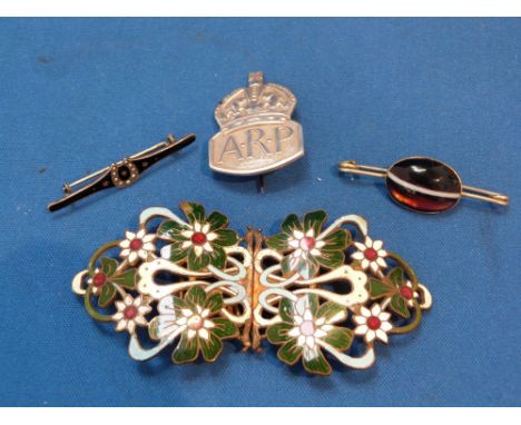 An enamelled buckle having floral decoration, an HM silver ARP brooch,  a bar brooch having ring agate decoration and a black