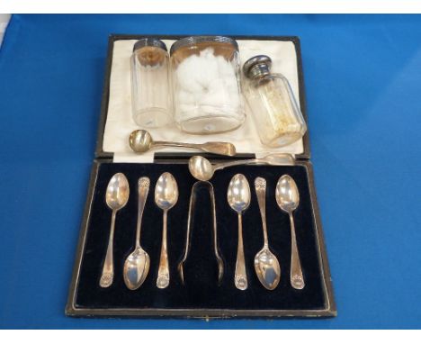 Three glass dressing table pots having HM silver lids inscribed M, a cased set of silver teaspoons with matching sugar nips h