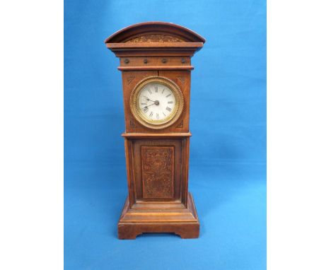 An Edwardian mahogany mantel clock modelled as miniature longcase clock