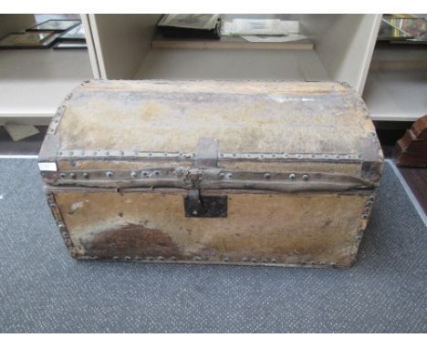 A 19th century dome top trunk having animal skin cover