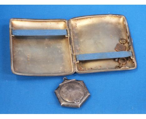 A silver cigarette case having scroll and floral decoration, Birmingham 198, Constantine & Floyd, and a small silver hexagona