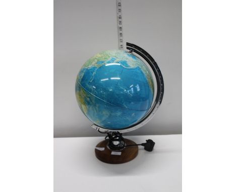 A bedside globe lamp 