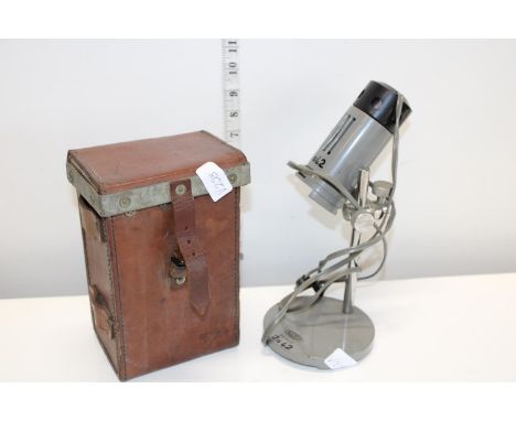 A WW2 303 Vickers machine gun belt case dated 1941 and a vintage Olympus inspection lamp 
