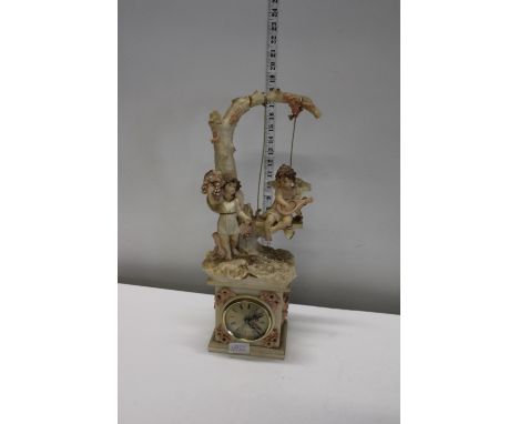 A large resin figural mantel clock shipping unavailable 