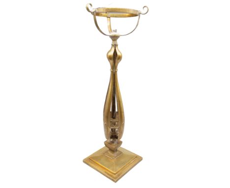 An early 20th century brass lamp base in the style of W A S Benson. Height 51cm. Needs rewiring.