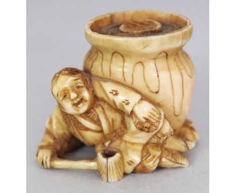A SMALL JAPANESE MEIJI PERIOD STAINED IVORY OKIMONO, unsigned and possibly intended as a netsuke, carved in the form of a man