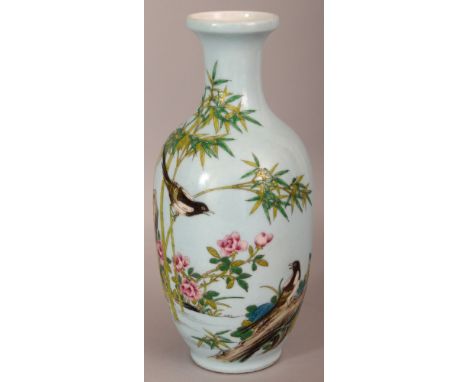 A GOOD QUALITY CHINESE FAMILLE ROSE BLUE GROUND PORCELAIN VASE, the sides decorated with calligraphy and with a scene of bird