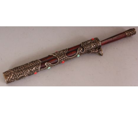 A CHINESE OR TIBETAN SILVER-METAL MOUNTED TRAVELLING SET, with knife but lacking chopsticks, the dragon embossed metal mounts