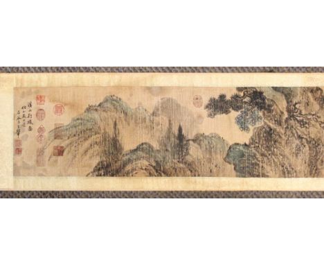 ANOTHER LONG CHINESE HORIZONTAL SCROLL PICTURE ON PAPER, with two panels of calligraphy and a central panel of an extensive r