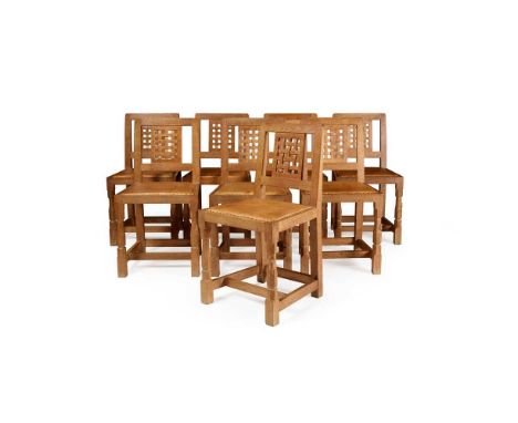 ROBERT 'MOUSEMAN' THOMPSON (1876-1955) SET OF EIGHT DINING CHAIRS, CIRCA 1970 oak, with close nailed leather seats, each with