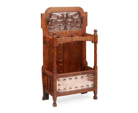 SHAPLAND &amp; PETTER, BARNSTAPLE ARTS &amp; CRAFTS STICK STAND, CIRCA 1910 oak, with repoussé-decorated copper panels and pa