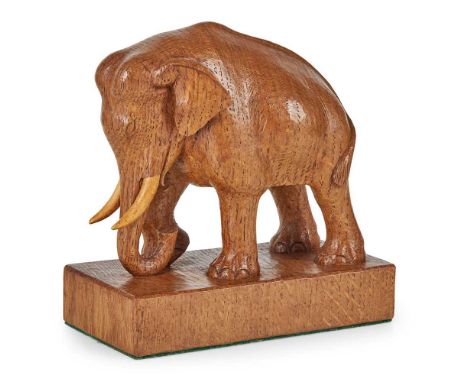 STAN ‘WOODPECKER’ DODDS (1928-2012) CARVED ELEPHANT FIGURE, CIRCA 1980 oak, with carved woodpecker signatureDimensions:16cm w