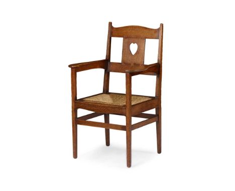 C.F.A. VOYSEY (1857-1941) (DESIGNER), F. C. NIELSON, LONDON (ATTRIBUTED MAKER) ARTS &amp; CRAFTS ARMCHAIR, CIRCA 1905 oak, wi