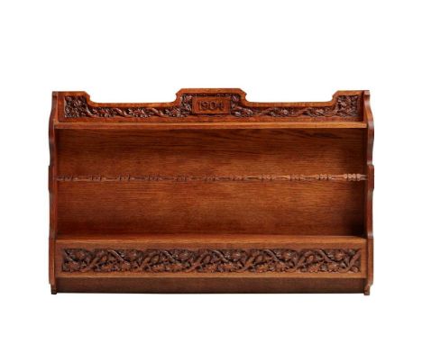 MARY R. PERCY (DESIGNER) ARTS &amp; CRAFTS WALL SHELVES, DATED 1904 carved oak, 99cm wide, 67.5cm high, 12cm deep; together w