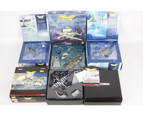 Corgi Aviation Archive - Four boxed 1:72 scale diecast military aircraft. Lot includes Corgi AA32404 Limited Edition Harrier 