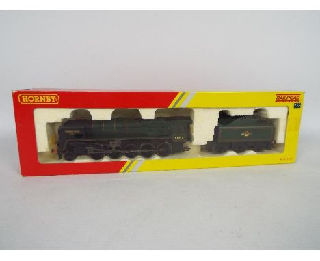 Hornby - a boxed 00 gauge BR 9F 2-10-0 named Evening Star operating number 92220 # R2785. The box is marked DCC Ready, the lo
