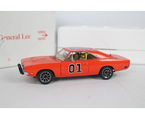 Danbury Mint - A boxed 1:24 scale 'Dukes of Hazzard - The General Lee, Dodge Charger by Danbury Mint. The model appears to be