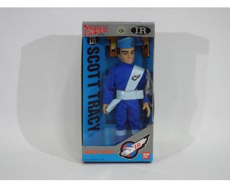 Bandai - A boxed Bandai 1992 'Thunderbirds' 'Scott Tracy' action figure. The figure appears Mint in a Good - Good Plus window