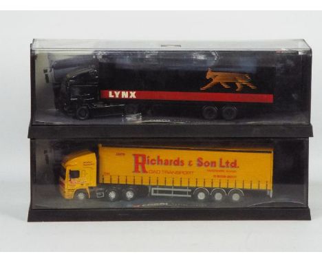 Corgi - A boxed pair of Corgi 1:50 scale 'Modern Trucks'. Lot contains #75001 ERF EC Box Trailer 'Lynx Express'; with #75204 