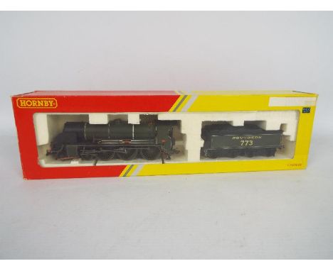 Hornby - A boxed 00 gauge 4-6-0 loco King Arthur class named Sir Lavaine operating number 773 in Southern livery. The box sta