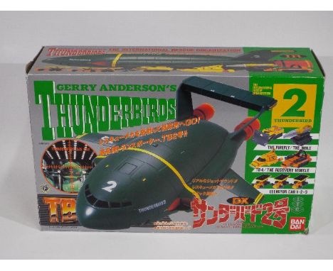 Bandai - A boxed 1992 Japanese Bandai Thunderbird 2 and Vehicles Set. The plastic TB2  appears to be in Excellent dusty condi