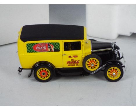 Danbury Mint - A boxed 1:24 scale #127-003 'Replica of the 1931 Coca Cola Delivery Truck' by Danbury Mint. The model appears 