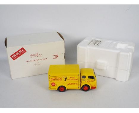 Danbury Mint - A boxed 1:24 scale #127-005 'Replica of the 1955 Coca Cola Delivery Truck' by Danbury Mint. The model appears 