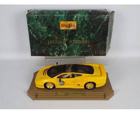 Maisto - A boxed diecast 1:12 scale Maisto #33201 'Goldshield Collectables' Limited Edition 1992 Jaguar XJ220. The model appe