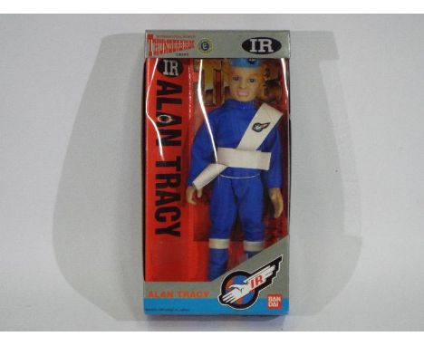 Bandai - A boxed Bandai 1992 'Thunderbirds' 'Alan Tracy' action figure. The figure appears Mint in a Very Good window box wit