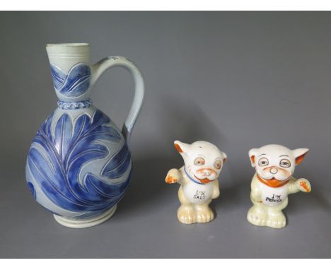 A novelty ceramic dog cruet - Height 8cm - good condition and a Doulton jug - chip to rim
