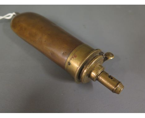 An early 19th century brass and copper powder flask marked G & J.W. Hawksley, Sheffield - Length 17cm 
Condition report: Fair