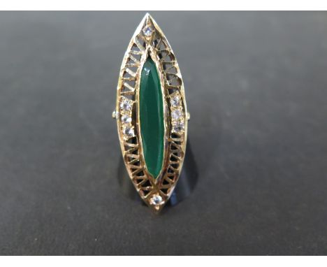 A green and white gem navette-shape dress ring - Tests as higher carat gold - Ring size K - Weight approx 7.5gms
Condition Re