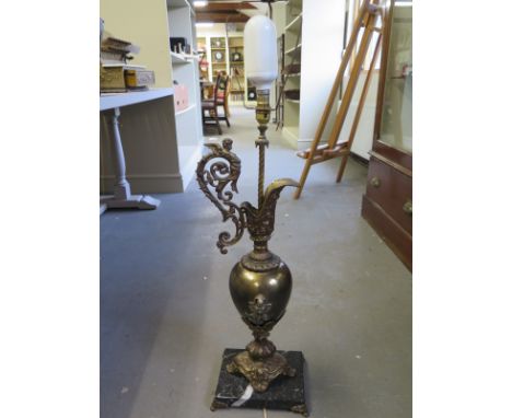 A gilded ewer table lamp on a marble base - Height 75cm - needs rewiring