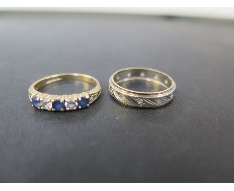 Two 9ct gold rings - To include a sapphire and cubic zirconia five-stone ring - Size M - Together with a bi-colour white-gem 