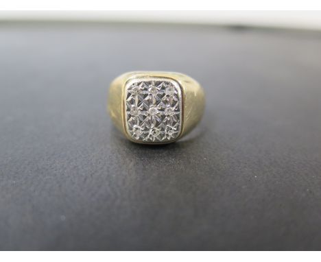 A 9ct bi-colour gold diamond panel ring - Hallmarked London - Ring size R 1/2 - Weight approx 6.4gms
Condition Report: Good -