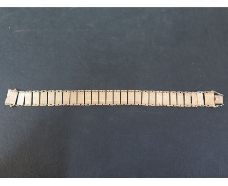 A textured panel bracelet - Stamped 9ct - Length 19cms - Weight approx 13.7gms
Condition Report: Fair - With light surface sc