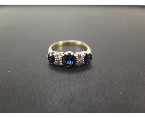 A sapphire and diamond dress ring - Stamped 18ct and plat - Ring size K 1/2 - Weight approx 3.4gms 
Condition Report: Good