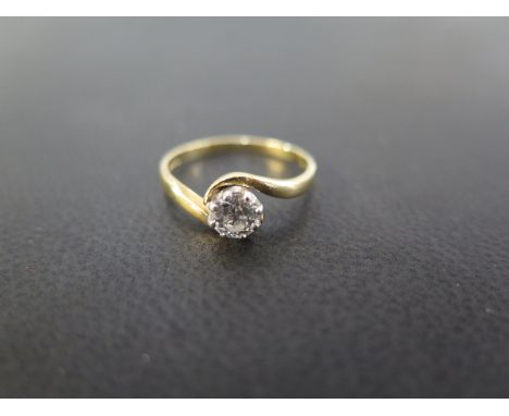 An 18ct gold diamond crossover ring - Estimated diamond weight 0.40ct - Estimated H-I colour - VS2-SI1 clarity - Hallmarked L