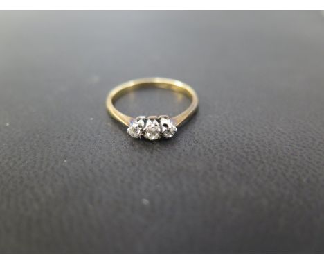 An old-cut diamond three-stone ring - Stamped 18ct & plat - Ring size K 1/2 - Weight approx 1.5gms
Condition Report: Good - W