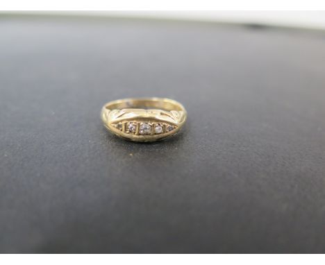 An 18ct gold diamond boat-shape ring - Hallmarked Chester - Ring size K - Weight approx 2.8gms
Condition Report: Good to fair