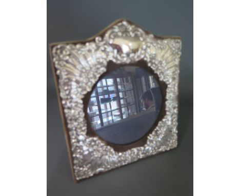 A 20th century silver embossed photo framed - London K F Ld - Height 22cm x Width 19cm 
