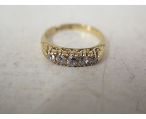 An 18ct gold old-cut diamond graduated five-stone ring - Hallmarked London - Ring size L 1/2 - Weight approx 3.7gms
Condition